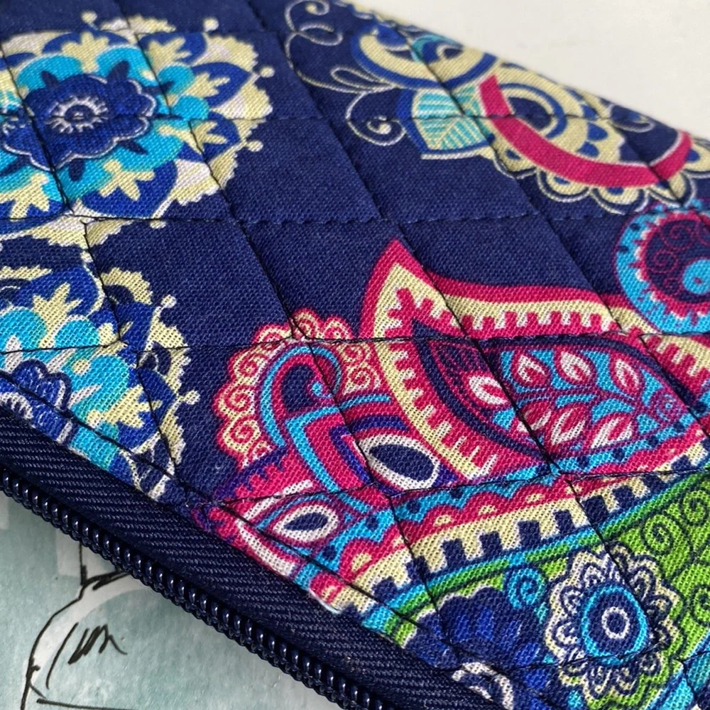 Paisley print wristlet ITEMS $8 or less BOGO . Bundle I will discount.